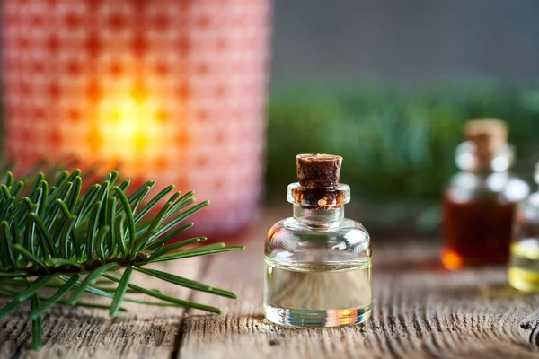 Bottle Aromatherapy Essential Oil Fir Branches Christmas Candle Background — Stockfoto