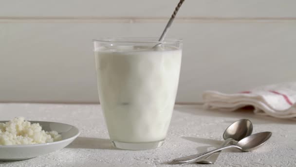 Stirring Fresh Homemade Kefir Probiotic Drink Spoon Kefir Grains Foreground — Vídeos de Stock