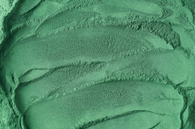 Fotokopi alanı olan arka plan, yeşil spirulina alg tozundan yapılmış.