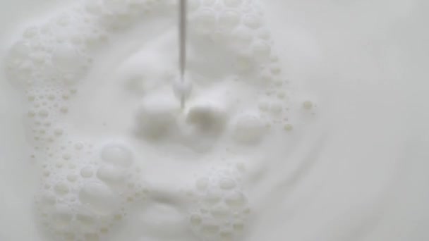 Fresh Milk Being Poured White Surface Slow Motion — Stock Video