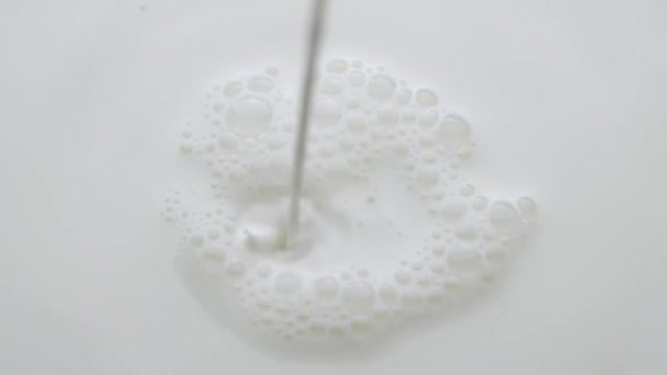 Closeup Milk Being Poured White Surface Slow Motion — Stock Video