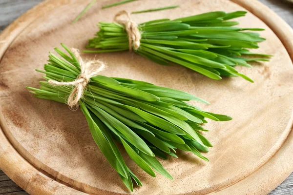 Two Bundles Freshly Grown Young Green Barley Grass Table Healthy — Stockfoto