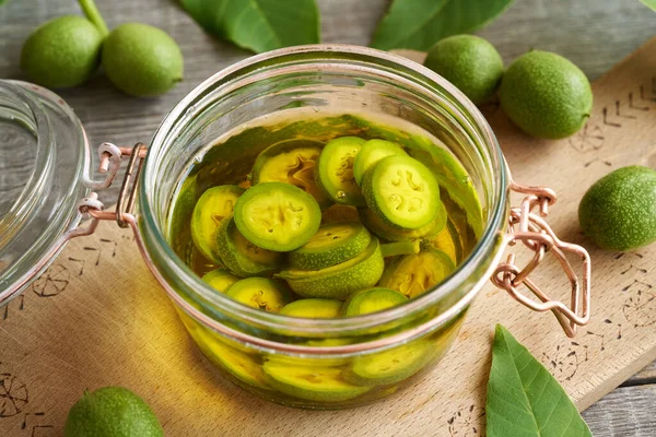 Preparation Homemade Nut Liqueur Green Unripe Walnuts Glass Jar — Fotografia de Stock