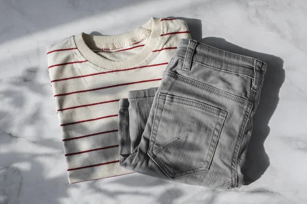 Striped Shirt Grey Shorts Marble Background Top View — Photo