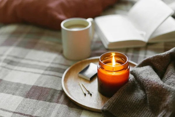 Burning Candle Wooden Wich Amber Glass Gar Open Book Cup — Stock Photo, Image