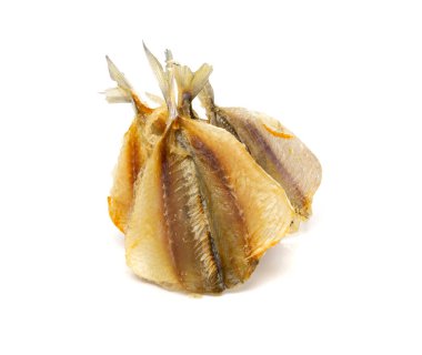 Dry salted yellowstripe scad. Dried small fish isolated, selaroides snack, stockfish beer snacks, dried flat fillet on white background top view clipart