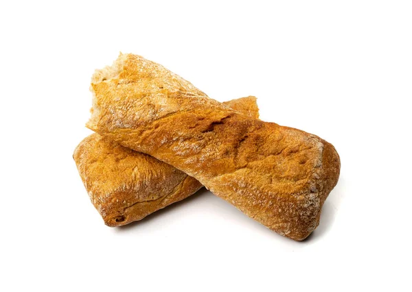 シアバッタのパンの一部が孤立した 白い背景に長いイタリアのChiabattaローフ トップビュー食品写真 — ストック写真