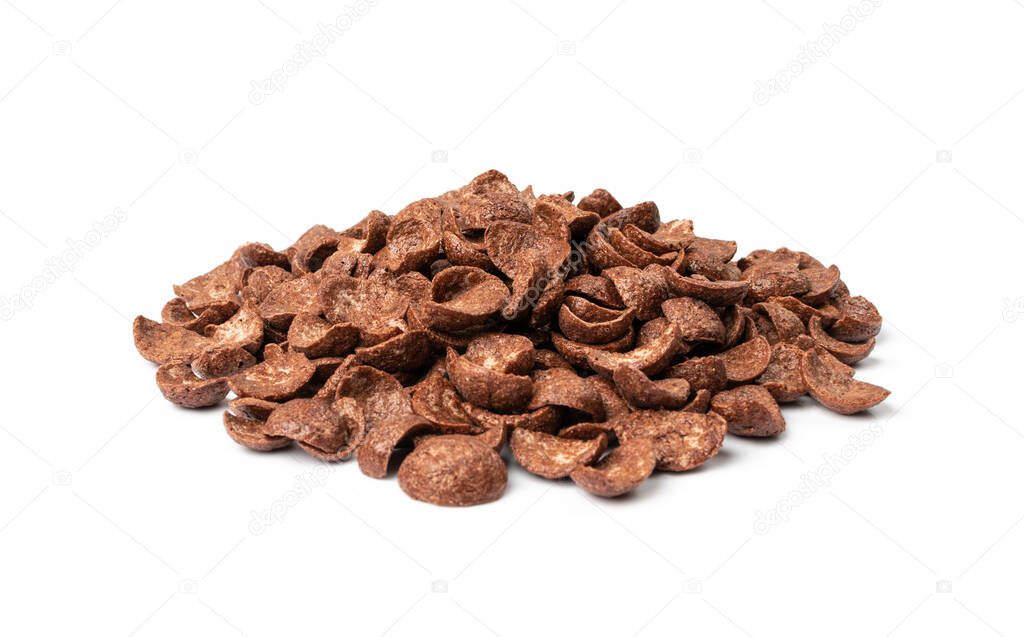 Chocolate corn flakes isolated. Cornflakes pile for breakfast, heap of brown choco cereals, crispy rice flakes, healthy snack group on white background