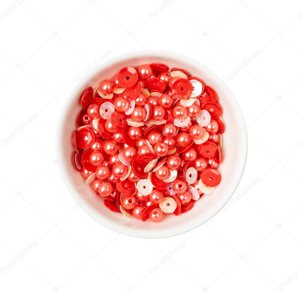 Red bead collection. Beading craft accessory, beads set, beadwork handicraft elements top view