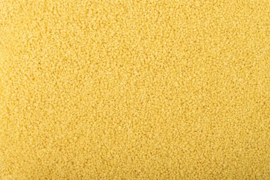 Kuskus dokusu arkaplan üstü görünümü. Kuru kümes deseni, çiğ kuskus duvar kağıdı, pişmemiş öksürük ya da kopya alanı olan irmik tanecikleri.