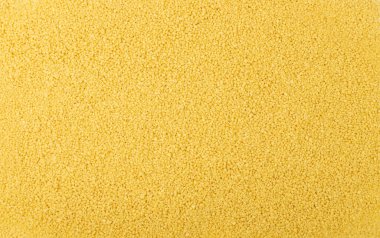 Kuskus dokusu arkaplan üstü görünümü. Kuru kümes deseni, çiğ kuskus duvar kağıdı, pişmemiş öksürük ya da kopya alanı olan irmik tanecikleri.