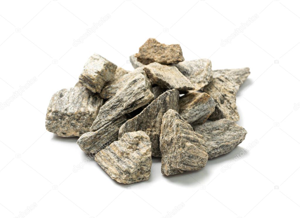 Gneiss pebbles pile Isolated. Granodiorite stones group, grey basalt pieces heap on white background