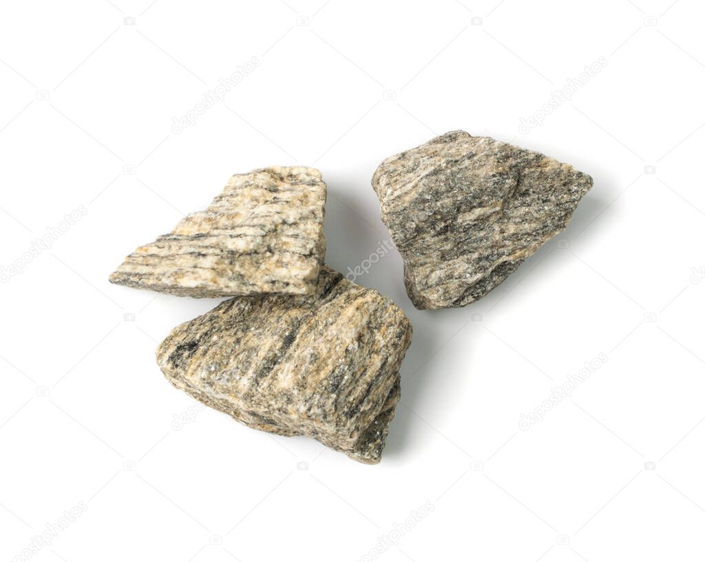 Gneiss pebbles pile Isolated. Granodiorite stones group, grey basalt pieces heap on white background top view