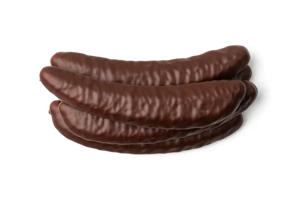 巧克力香蕉分离 香蕉形状的糖果 果香点心 香蕉酥覆盖着巧克力釉面在白色的背景图 — 图库照片