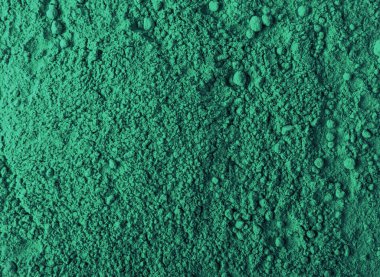 Spirulina powder texture background. Dry chlorella textured pattern, seaweed flour wallpaper, powdered kelp, spirulina powder mockup top view with copy space