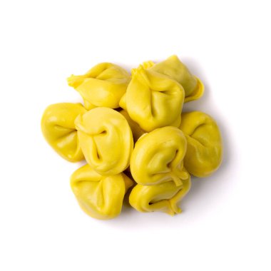 Tortellini isolated. Agnolotti, cappelletti, italian dumplings, stuffed pasta, yellow tortelloni, handmade ravioli, cappelletti, uszka on white background top view