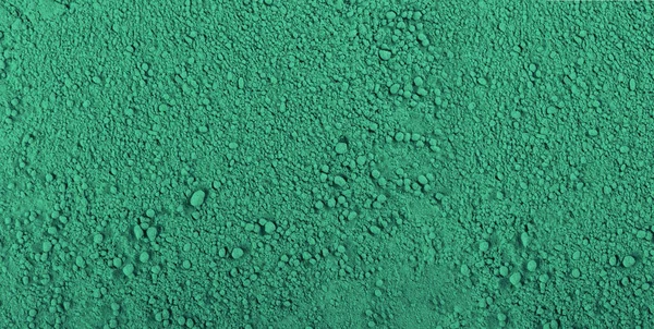 Spirulina powder texture background. Dry chlorella textured pattern, seaweed flour wallpaper, powdered kelp, spirulina powder mockup top view with copy space