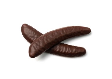 Muzlu çikolatalı izole. Muz şekilli şekerler, meyveli aromalı aperatifler, muzlu sufle çikolata kaplı beyaz arka plan görüntüsü.