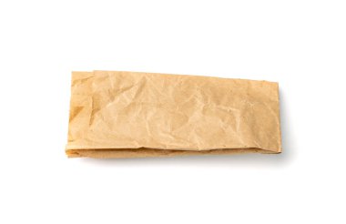 Brown paper bag isolated. Crumpled disposable ecology container, wrinkled paperbag, kraft paper bag on white background top view