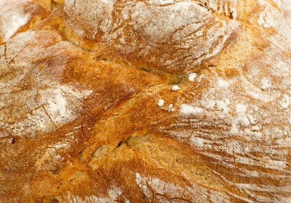 パン地殻テクスチャ背景を閉じる 黄金のパンの葉の表面の背景コピースペースとモックアップ — ストック写真