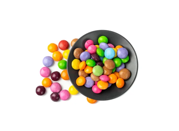 Verstreut Kleine Bonbons Auf Schwarzem Teller Bunte Dragees Bunt Glasierte — Stockfoto