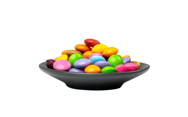 Small Candies Pile Black Plate Isolated Colorful Dragees Multicolored Glazed — Stock Photo, Image