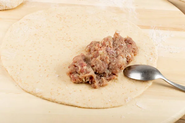 Making Meat Stuffed Closed Pie Isolated. Turnover with Filling, Stuffed Chebureki, Tatar Cuisine, Asia, Eastern Europe Food