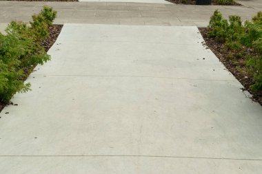 Modern asfaltlı yol dokusu, yeni kaldırım deseni, patika duvar kağıdı, mermer tuğla yol, granit fayanslar üst görünümü olan yürüme yolu