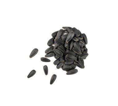 Ayçiçeği tohumları izole. Raw dağınık ayçiçeği tohumu grubu, kabuklu güneş çiçeği taneleri, beyaz arka plan görünümlü taze yenilebilir yağ çekirdekleri yığını