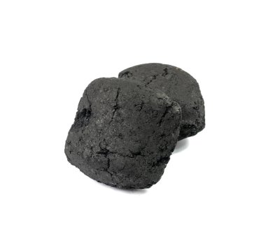 Coal briquette isolated. Pressed charcoal for braai, coconut barbecue coal, bbq briquettes, grill charcoal on white background
