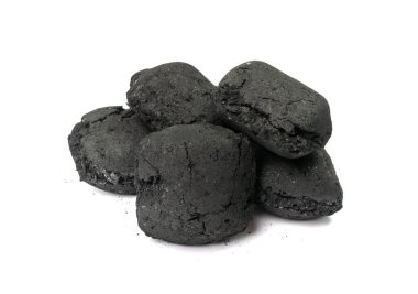 Coal briquette isolated. Pressed charcoal for braai, coconut barbecue coal, bbq briquettes, grill charcoal on white background