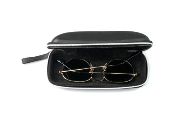 Glasses box isolated. Eyewear case closeup, eyeglasses box with selective focus, macro shot of glasses casing on white background
