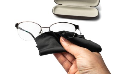 Black glasses cloth isolated. Lens rag, eyeglasses cleaning microfiber clothes, wiping cotton napkin, microfibre fabric for eyewear cleanliness, eye glasses cloths on white background