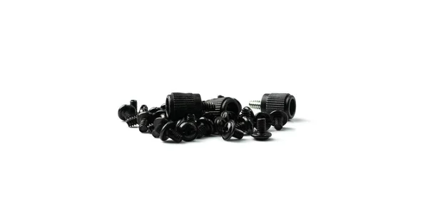 Black Computer Bolts Isolated Heap Small Bolts Screws Nuts White — 图库照片