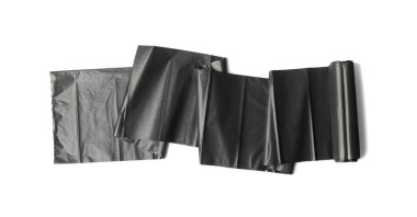 Garbage bag roll isolated. Trash package, new rolled plastic bin bags, black polyethylene waste container on white background