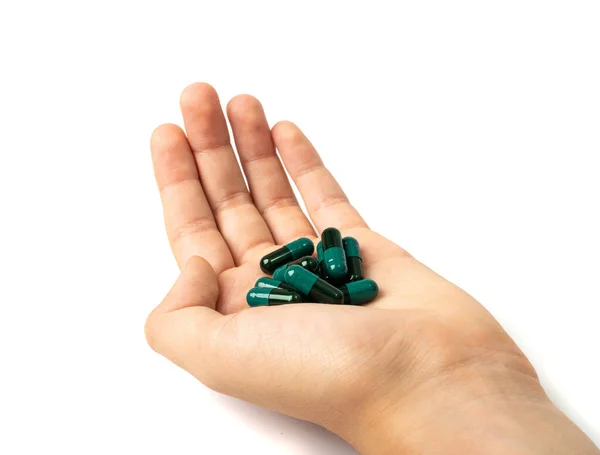 Black Green Pills Hand Capsule Pile Isolated Hand Holds Drugs —  Fotos de Stock