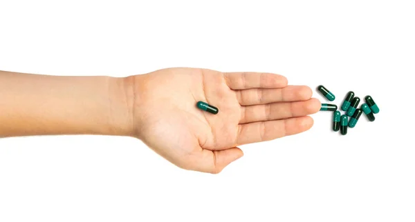 Black Green Pills Hand Capsule Pile Isolated Hand Holds Drugs — ストック写真