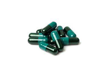 Black green pills. Capsule pile isolated, drugs set, pill collection, medicine capsules group on white background