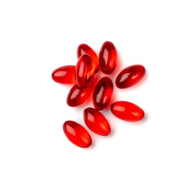 Kırmızı hap kapsülleri izole edilmiş, ağrı kesici ilaçlar, yatıştırıcı haplar, beyaz arka planda ilaç jeli kapsülleri.