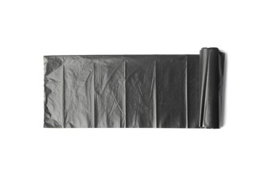 Garbage bag roll isolated. Trash package, new rolled plastic bin bags, black polyethylene waste container on white background