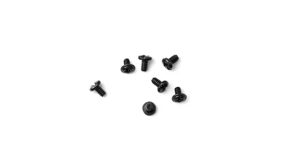 Black Computer Bolts Isolated Heap Small Bolts Screws Nuts White — ストック写真