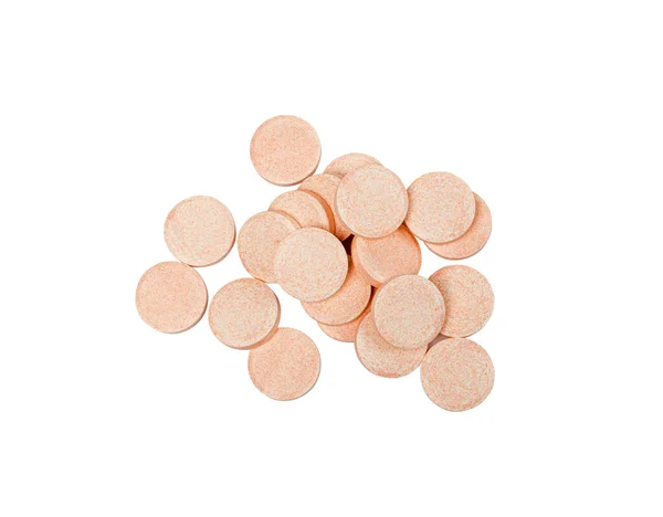 発酵錠剤は単離された 固定錠剤群の閉鎖 白の背景にピンクオレンジ色の発酵ビタミンサプリメント クリッピングパス — ストック写真