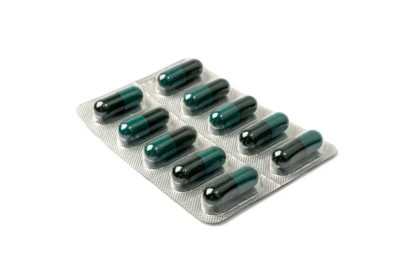 Pill Blister Isolated Black Green Capsule Package Drugs Packaging Pill — Stock fotografie