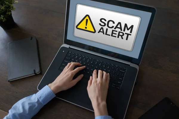 Scam alert detecting warning. Notification on device screen. — Stock Photo, Image