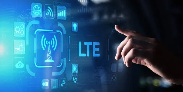 Conceito de banda LTE, internet móvel e tecnologia de telecomunicações em tela virtual. — Fotografia de Stock