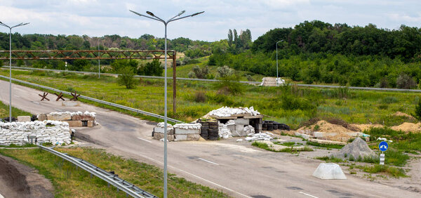 War in Ukraine. Checkpoint. Defensive structures.