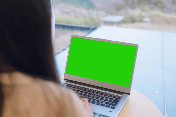 woman playing computer green screen computer for design