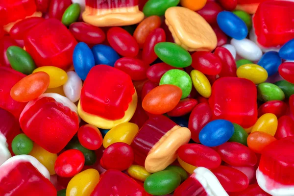 各种形状的彩色糖果的背景 — 图库照片