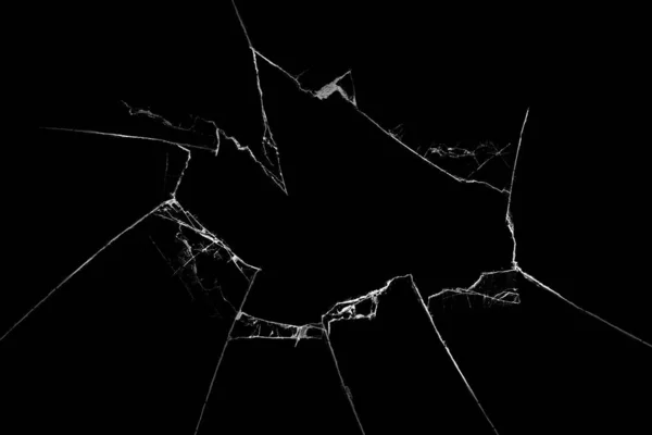 Siyah arka planda kırık bir cam.