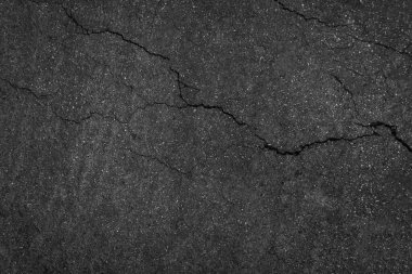 Sert asfalt üst görünümünün arkaplan dokusunu kır
